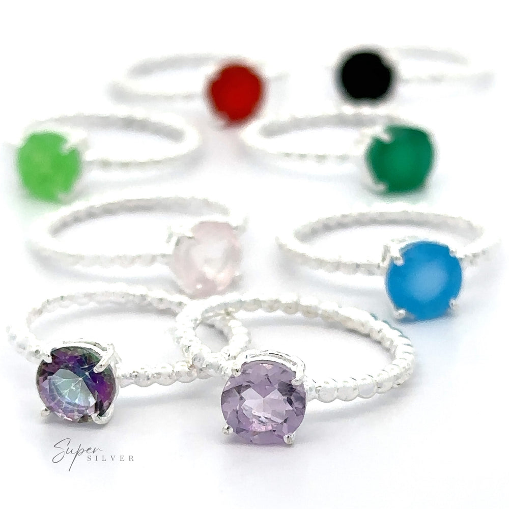 A collection of Stunning Circular Gemstone Rings with Beaded Band in Small Sizes.