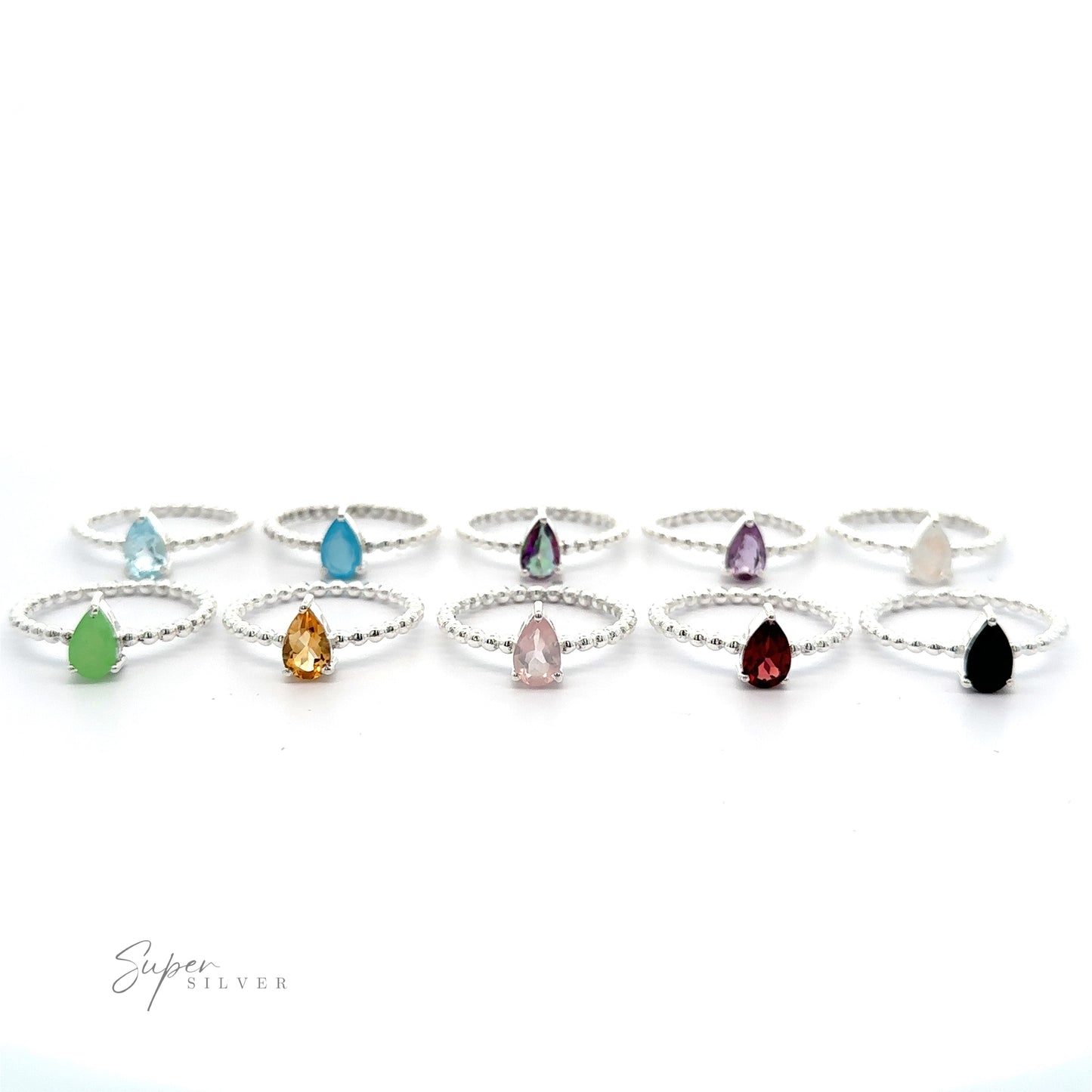 
                  
                    A collection of Sparkling Teardrop Gemstone on Beaded Band rings with various colored teardrop gemstones, displayed against a white background.
                  
                