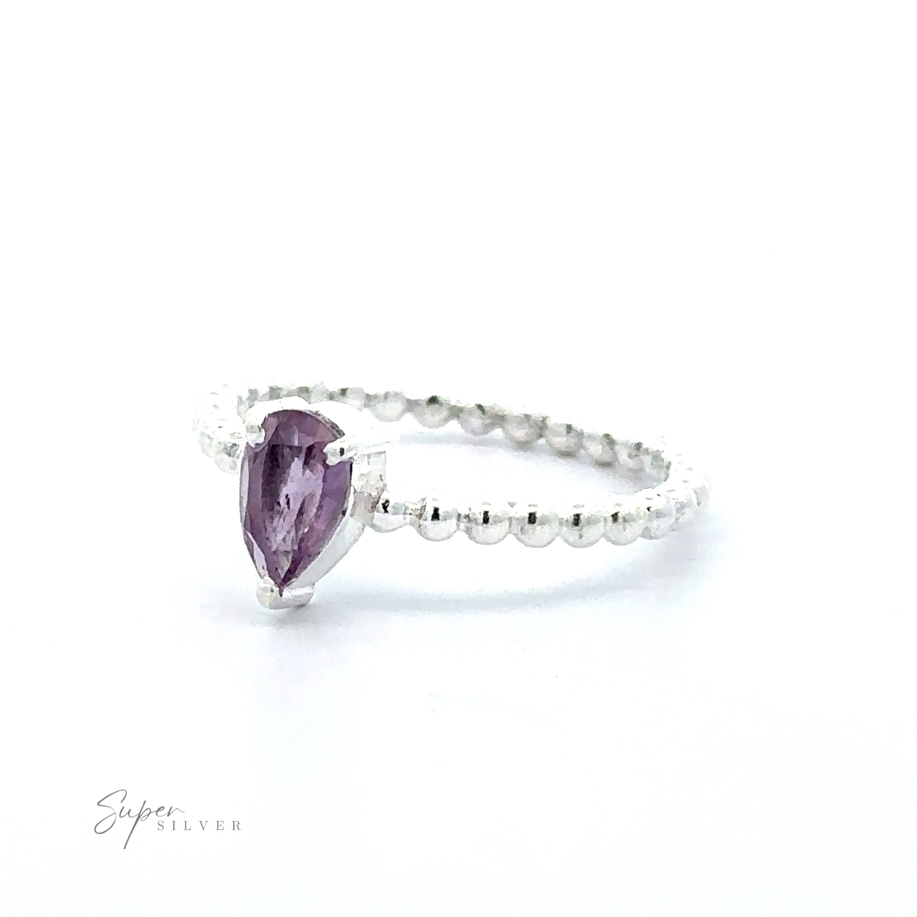 A Sparkling Teardrop Gemstone on Beaded Band ring displayed against a white background.