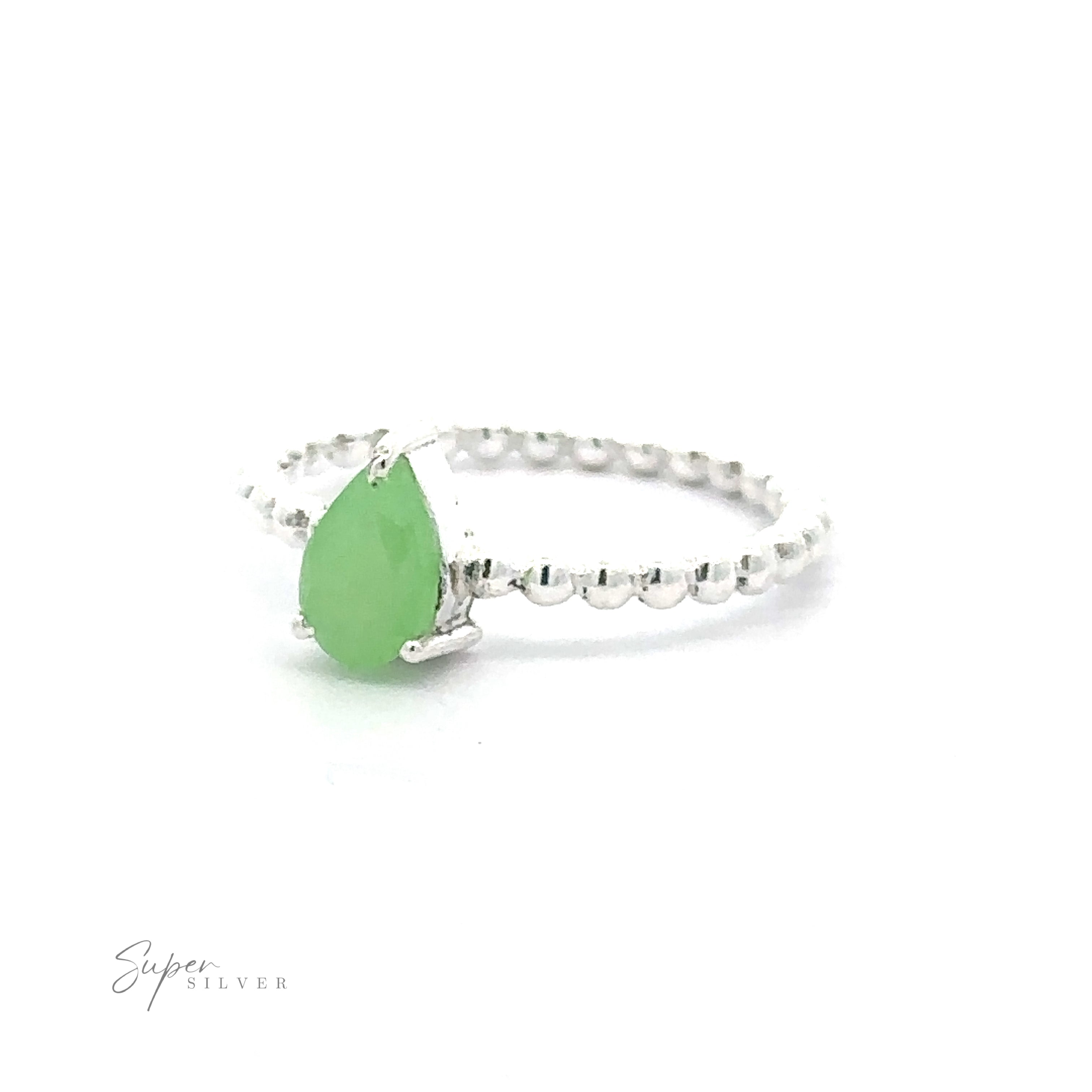 Sparkling teardrop gemstone on beaded band with a green hued gemstone in a prong setting on a white background.