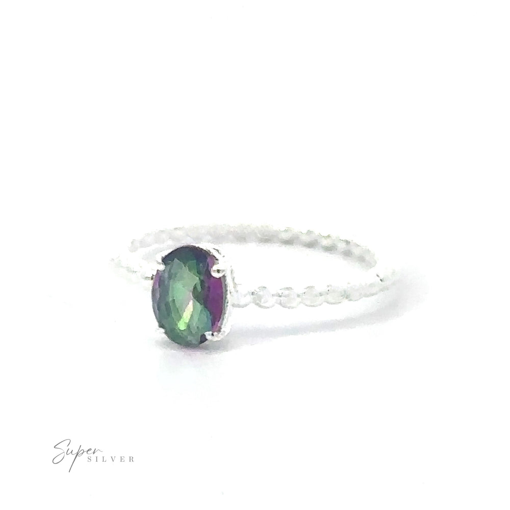 
                  
                    A Stunning Oval Gemstone Ring with Beaded Band featuring a multicolored amethyst on a white background.
                  
                