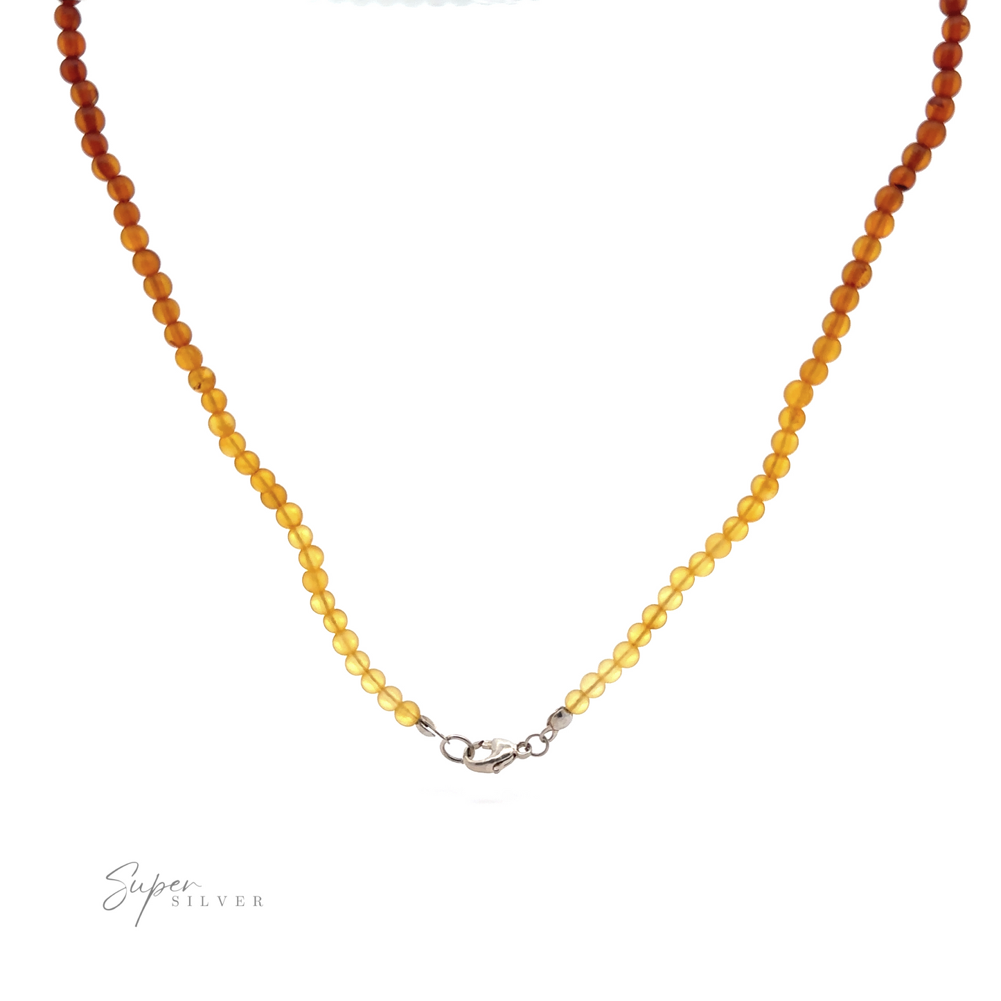 
                  
                    A stunning Ombre Beaded Amber Necklace with a gradient of round beads ranging from amber to yellow, featuring a sterling silver clasp. The beads are arranged in a single strand and taper in color intensity. "Super Silver" is written at the bottom left, marking this exquisite piece of sterling silver jewelry.
                  
                