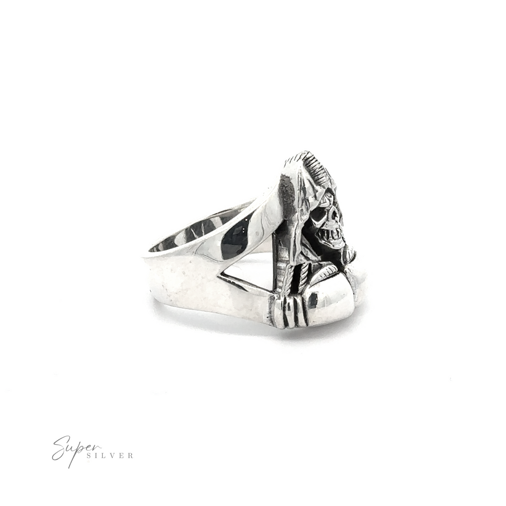 
                  
                    A Grim Reaper With Boxing Gloves Ring featuring a sculpted skull design with intricate details, crafted from .925 Sterling Silver. The band has a thick and sturdy appearance, embodying the essence of a heavy silver ring. "Super Silver" logo in the bottom left corner.
                  
                