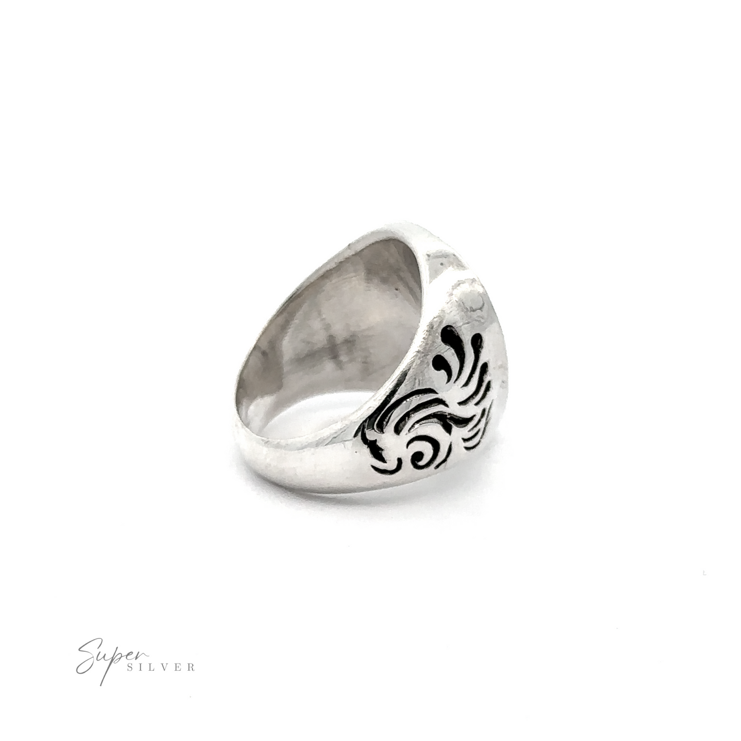 
                  
                    A heavy silver ring with guitar pick-shaped face features black engraved designs on a plain white background. The text "Guitar Pick Skull Ring" appears in the bottom left corner.
                  
                