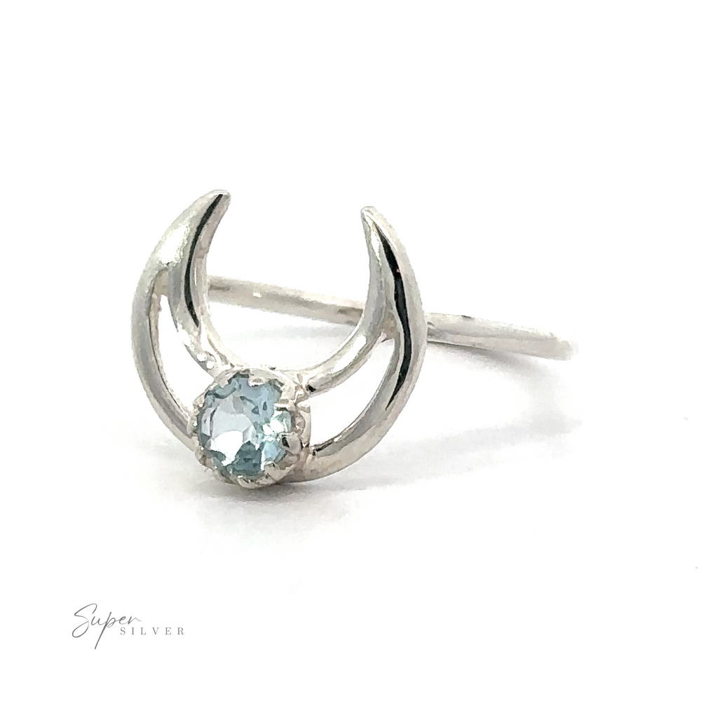 
                  
                    Online Exclusive Gemstone Moon Outline Ring with a central light blue moonstone on a white background.
                  
                