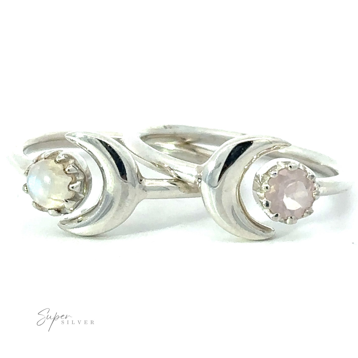 Online Exclusive Adjustable Gemstone Ring With Moon Design with two bands featuring wave-like designs, each band holding a light pink moonstone, displayed against a white background.