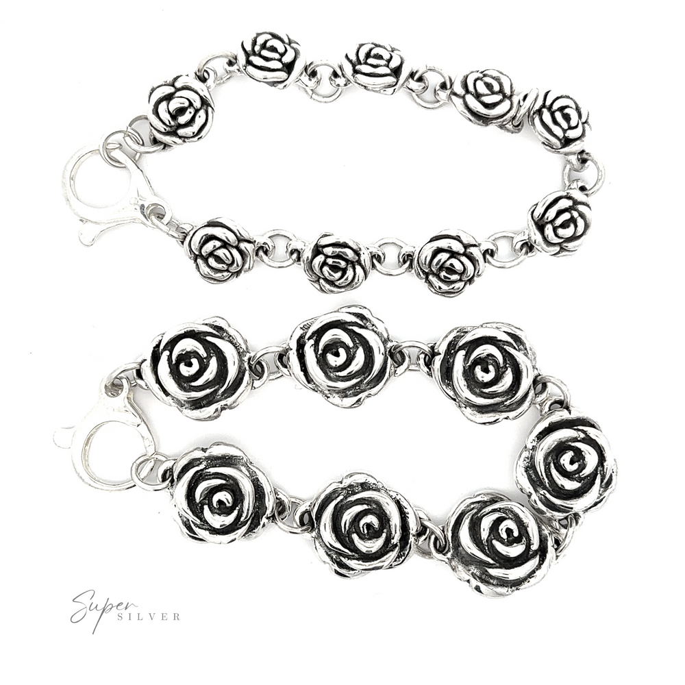 
                  
                    Two Chic Link Rose Bracelets with vintage vibes are displayed on a white background. One bracelet features smaller roses, while the other showcases larger blooms. The "Super Silver" logo is elegantly positioned in the bottom left corner.
                  
                
