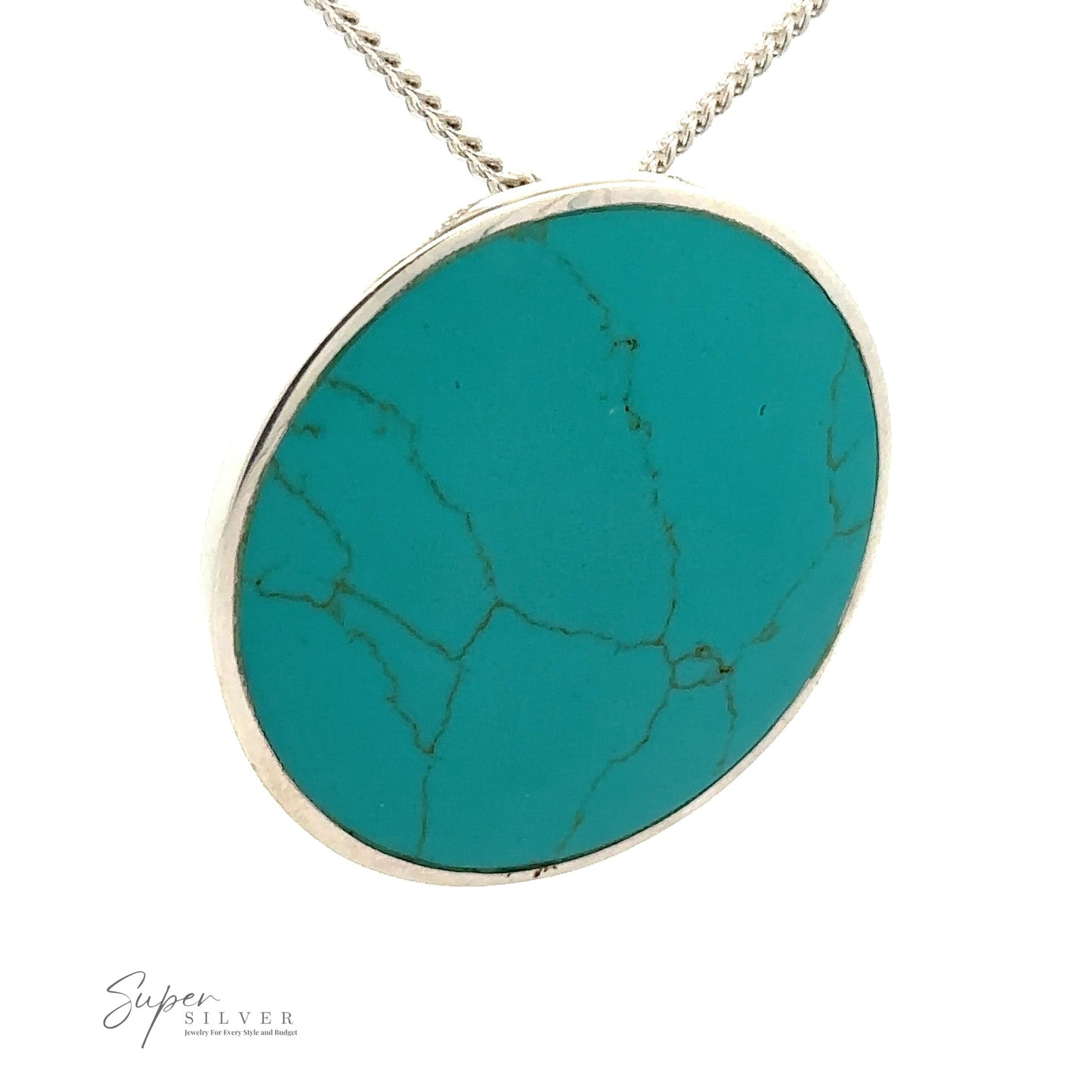 
                  
                    A Large Round Turquoise Pendant with visible veining set in a sterling silver bezel, hanging from a silver chain. This piece of minimalist jewelry also displays a partial logo with the text "Super Silver" in the lower left corner.
                  
                