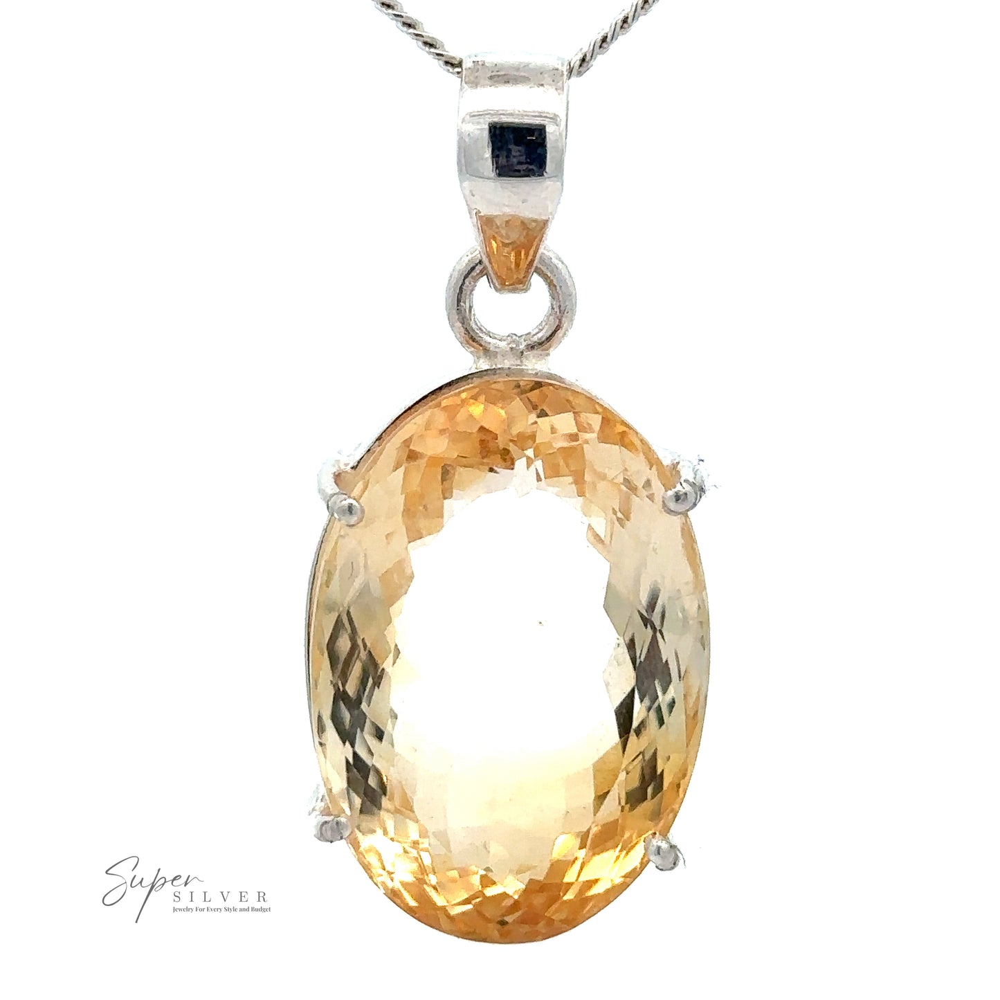 A Brilliant Pronged Citrine Pendant with an oval-shaped, light amber gemstone set in sterling silver, attached to a silver chain. The faceted cut gemstone adds extra sparkle, and the pendant has a small engraved "Super Silver" logo on the bottom left.