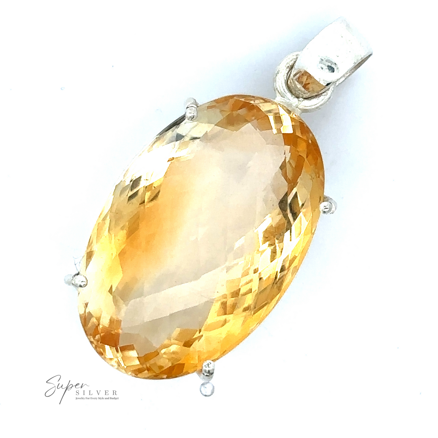 
                  
                    A Brilliant Pronged Citrine Pendant featuring an oval-shaped, faceted yellow gemstone set in .925 Sterling Silver with a bail. Text "Super Silver" is visible in the bottom left corner.
                  
                