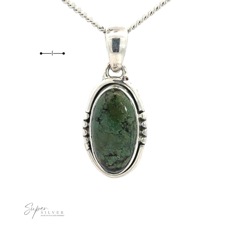 
                  
                    A silver necklace featuring a Natural Turquoise Elongated Oval Pendant with intricate detailing handcrafted from .925 sterling silver. The chain is of a rope design. The "Super Silver" logo appears at the bottom left.

                  
                
