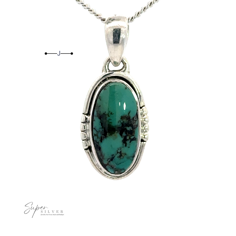 
                  
                    An elegant Natural Turquoise Elongated Oval Pendant set in handmade .925 sterling silver on a matching chain. The natural turquoise stone is beautifully complemented by an intricate design.
                  
                