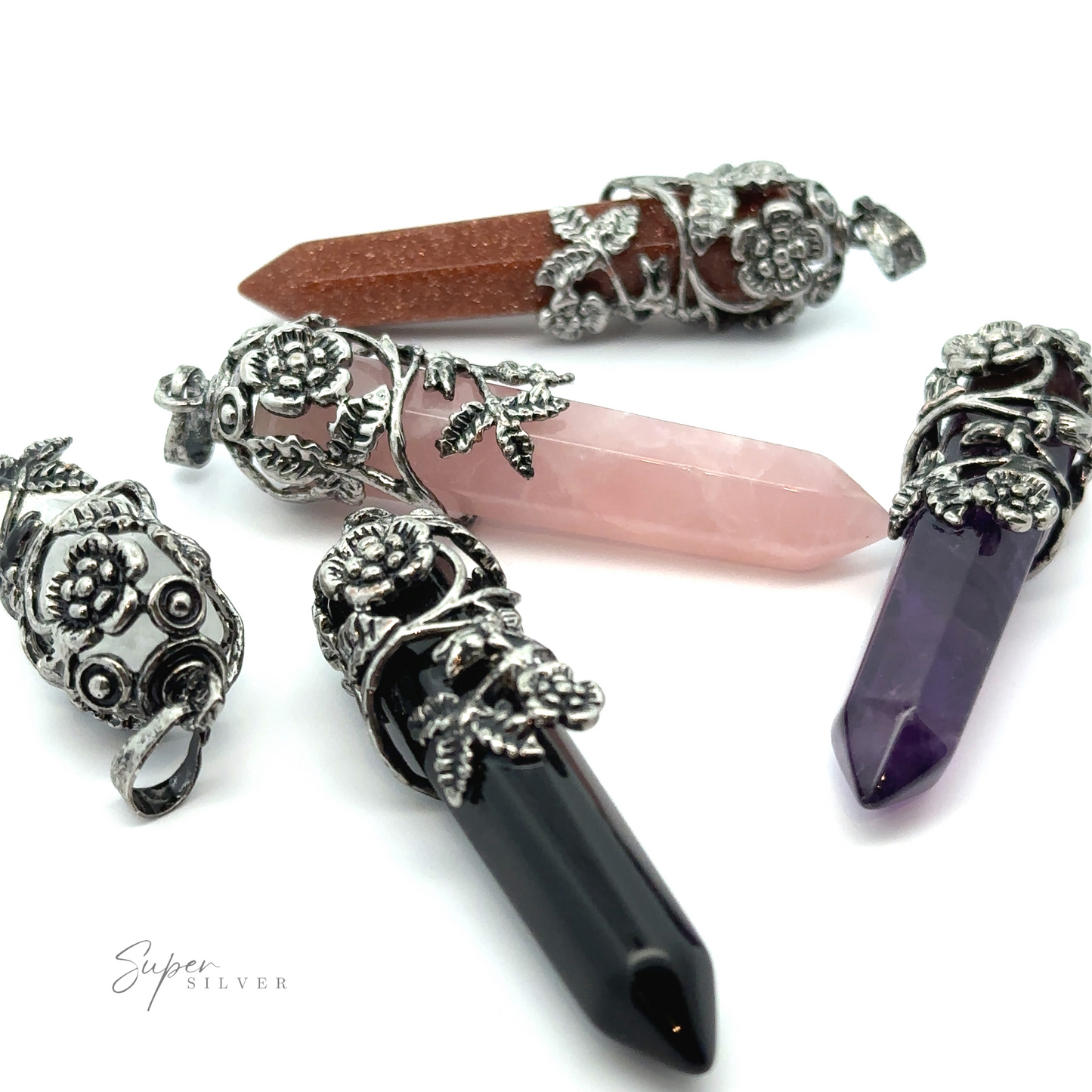 A set of five Silver-Plated Flower Design Stone Pendants with ornate silver caps featuring floral designs. The gemstones include rose quartz, amethyst, black onyx, and goldstone. The background is white.