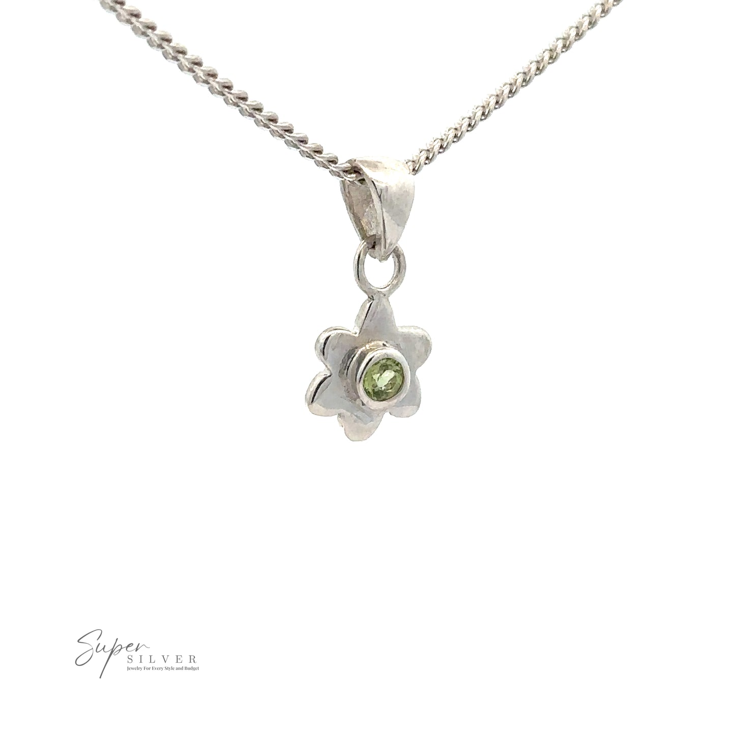 
                  
                    Tiny Gemstone Flower Pendant with a gemstone center, hanging gracefully on a silver chain.
                  
                