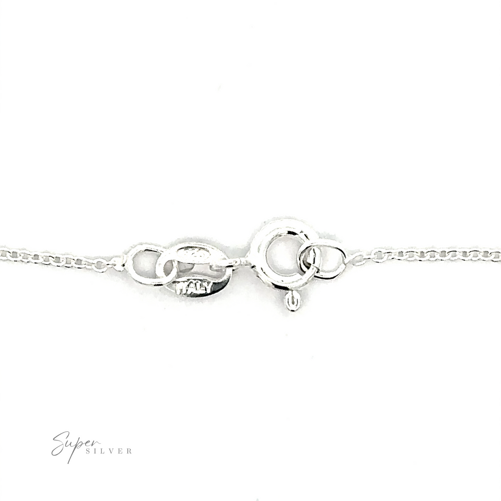 
                  
                    A close-up image of the Dainty Cable Chain clasp featuring an interlocking ring and hook mechanism, set against a plain white background. The text ".925 Sterling Silver" is displayed in the bottom left corner.
                  
                