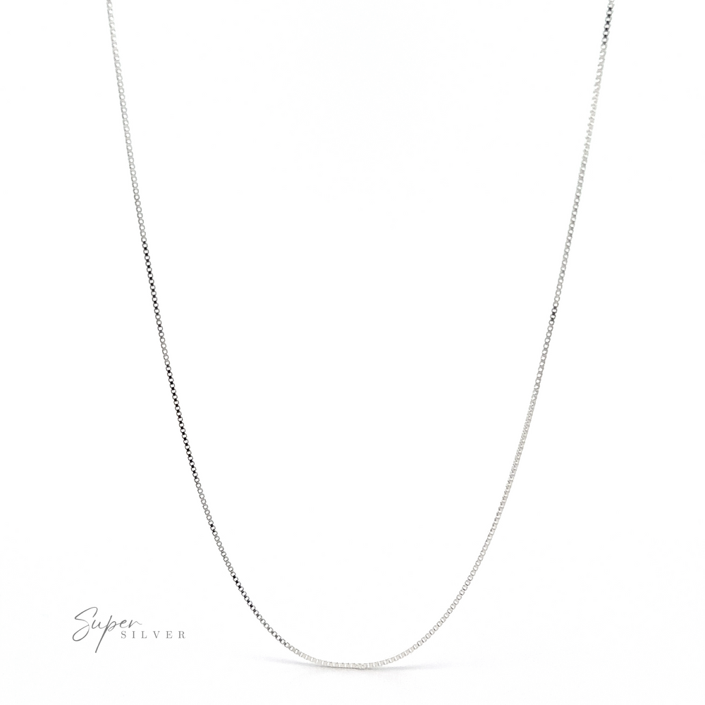 
                  
                    A thin, Italian-made Delicate Sterling Silver Box Chain necklace is displayed against a plain white background. The logo ".925 Super Silver" appears in the bottom left corner.
                  
                