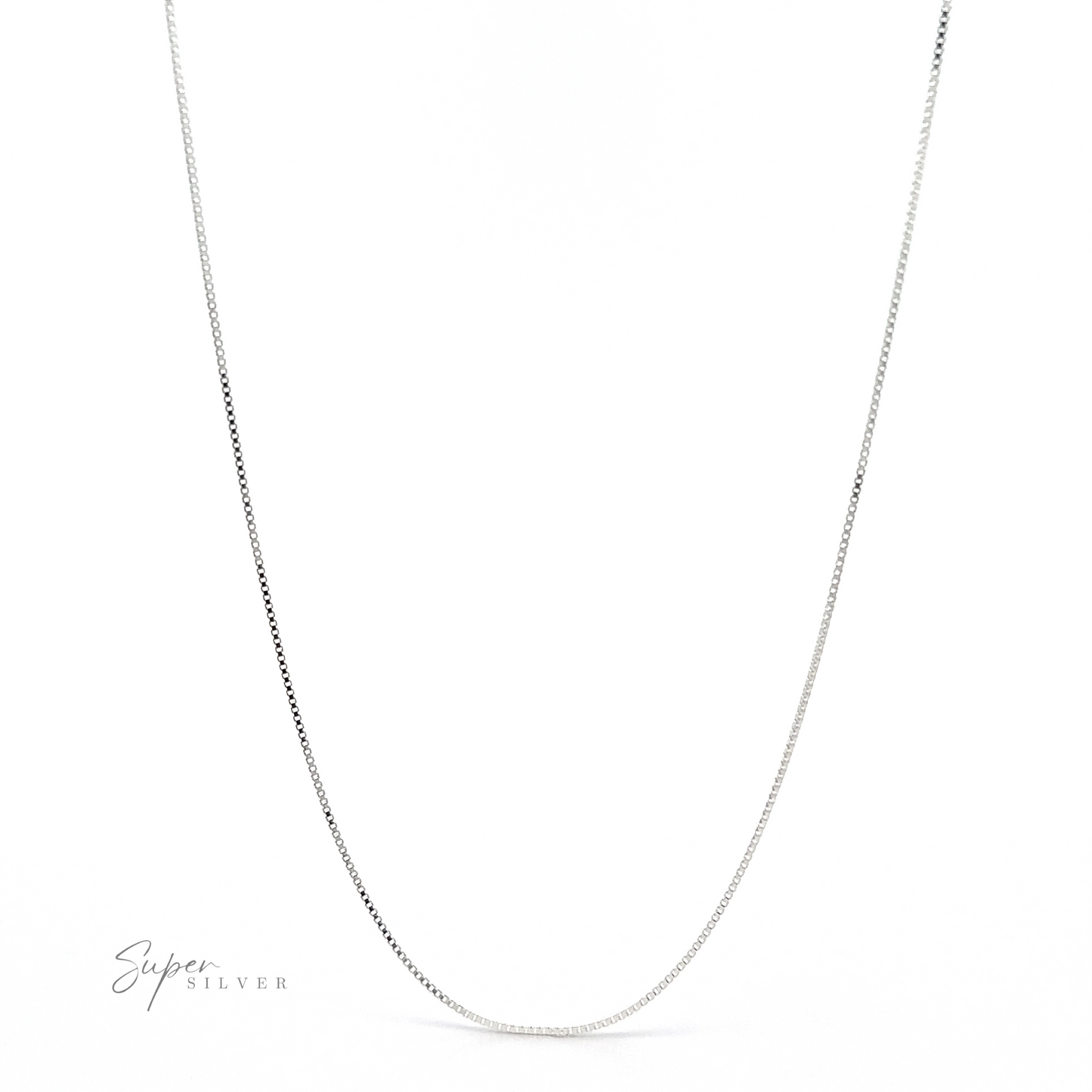 
                  
                    A thin, Italian-made Delicate Sterling Silver Box Chain necklace is displayed against a plain white background. The logo ".925 Super Silver" appears in the bottom left corner.
                  
                