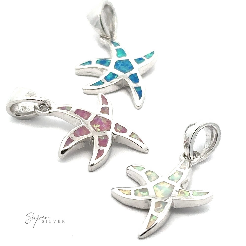 
                  
                    The Lab-Created Opal Sea Star Pendant showcases oceanic magic with three silver sea star designs, each featuring iridescent inlays in blue, pink, and green. The lab-created opal accentuates the pendants with an otherworldly beauty.
                  
                