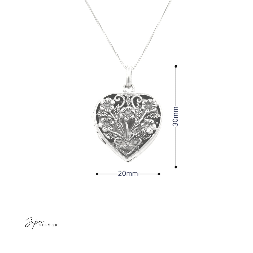 
                  
                    The Floral Heart Shaped Locket, made of sterling silver, features a delicate floral chain design and measures 30mm in height by 20mm in width, making it a charming keepsake.
                  
                