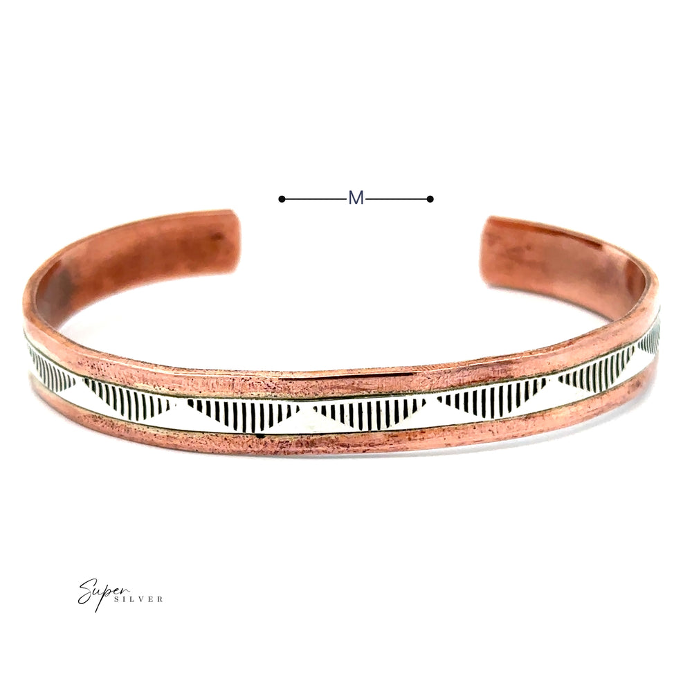 
                  
                    Explore the distinct allure of this Native American Handmade Copper And Silver Bracelet, featuring a bold geometric pattern and highlighting Randy Secatero's craftsmanship.
                  
                