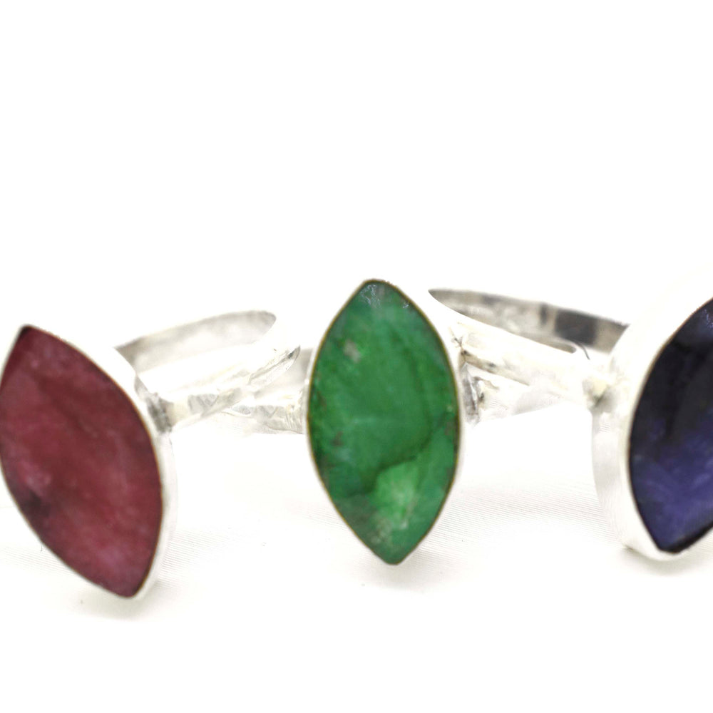 A boho set of three Simple Marquise Shaped Gemstone Rings with different colored stones.