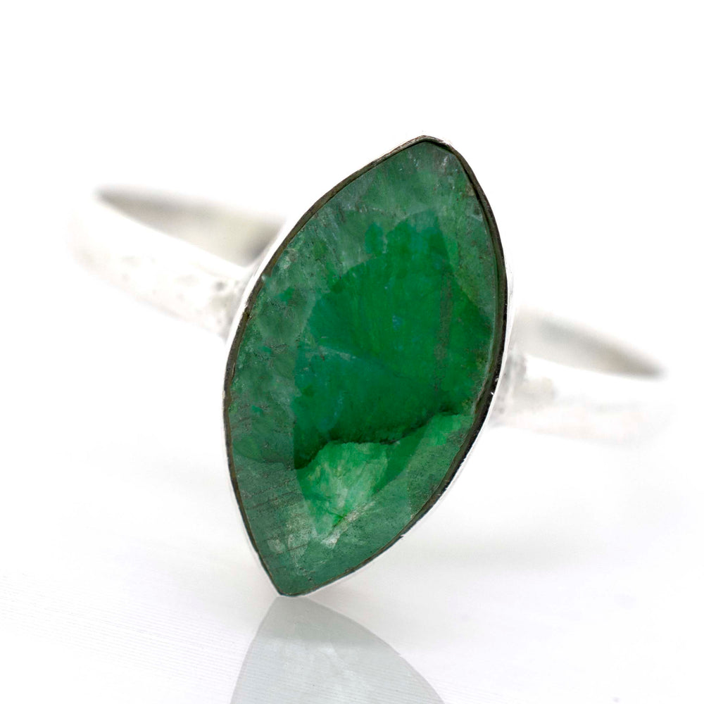 
                  
                    A sterling silver ring with a Simple Marquise Shaped Gemstone.
                  
                