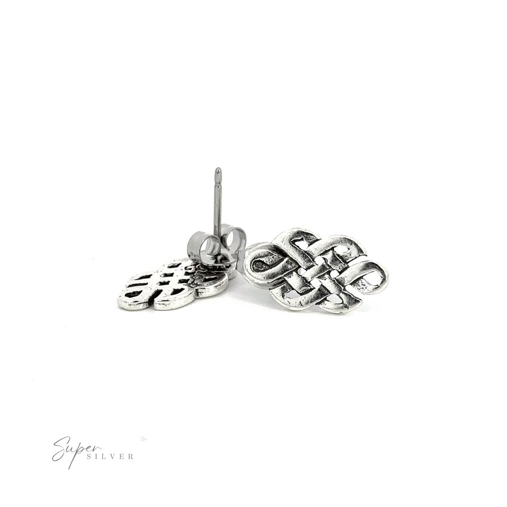 A pair of Celtic Knot Studs featuring a sterling silver design.