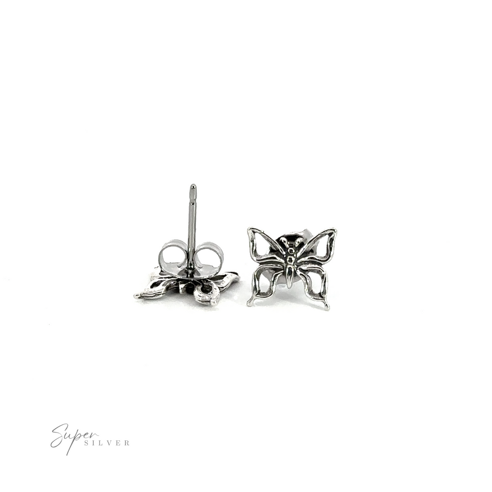 A pair of minimalist Butterfly Outline Studs on a white background.