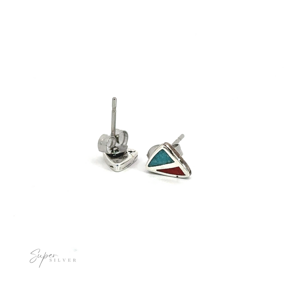 A pair of Coral and Turquoise Triangle Studs with a turquoise triangular shape.