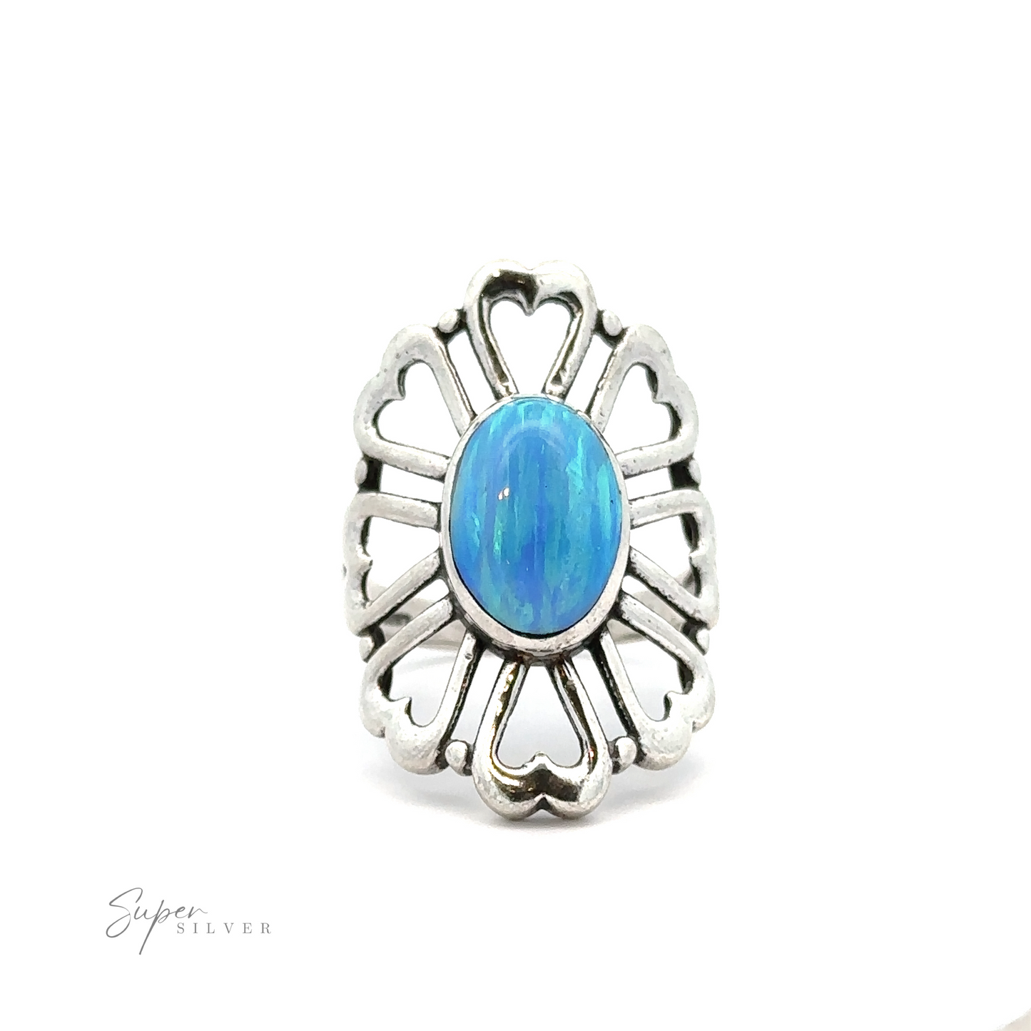 
                  
                    An American Made Opal Flower Ring with Heart Shaped Petals, encircled by heart-shaped motifs and radiating lines, is displayed against a white background. Handcrafted in America, the lower left corner bears the text "Super Silver.
                  
                