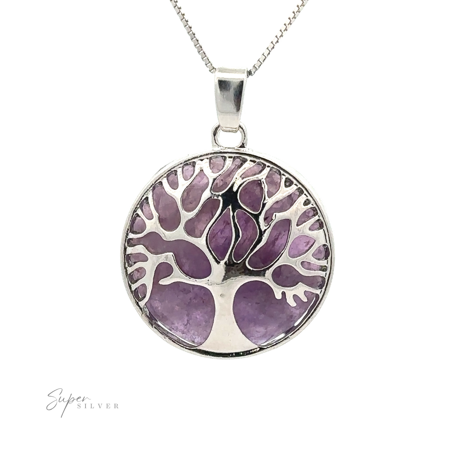 
                  
                    Tree of Life Pendant with a round Tree of Life pendant featuring a tree design overlaid on a purple background. The silver plated pendant is attached to a fine chain, with the text "Super Silver" visible on the lower left.
                  
                