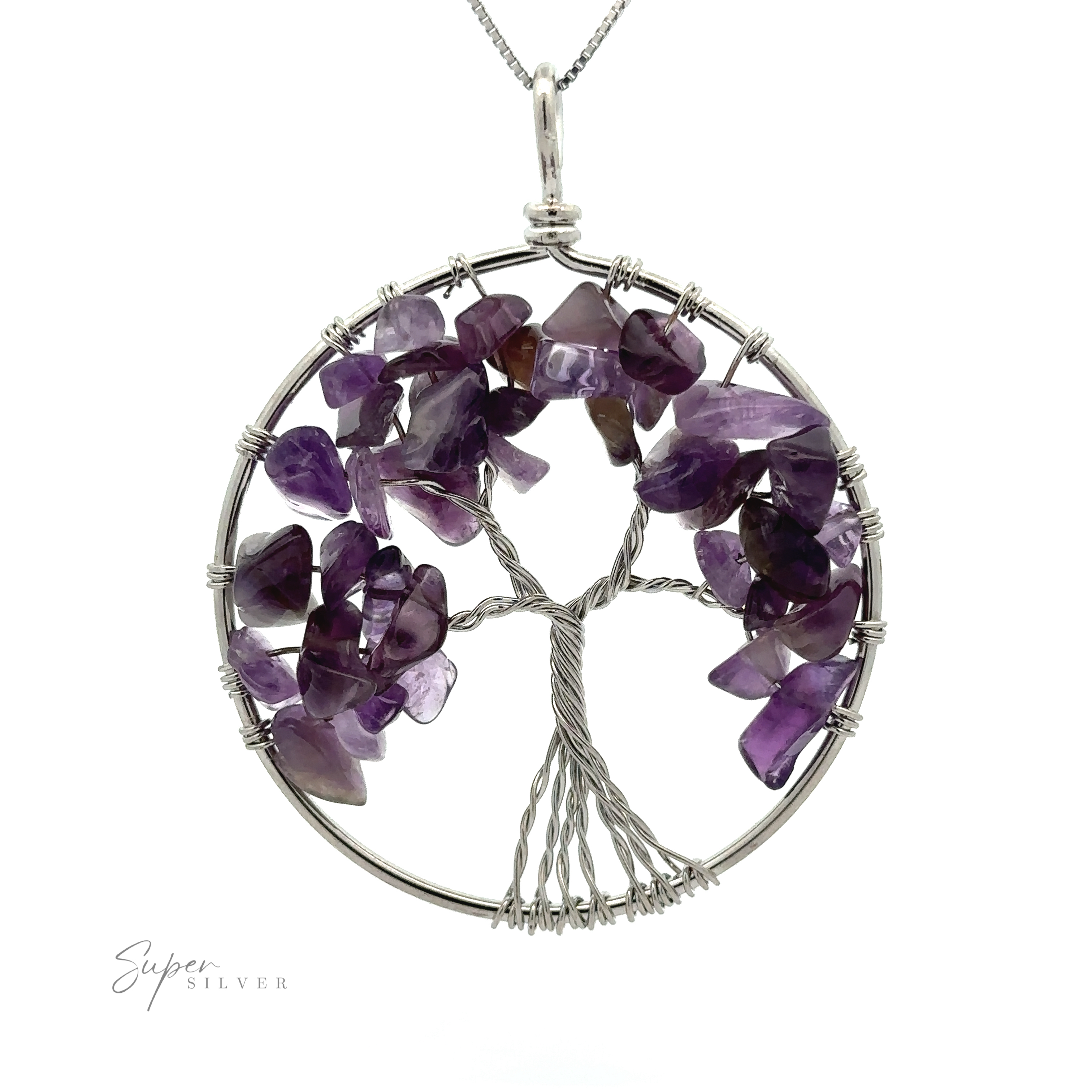 A Wire Wrapped Tree of Life Pendant featuring a wire-wrapped tree with purple gemstone leaves, set within a circular frame. The signature "Super Silver" is visible in the bottom left corner.