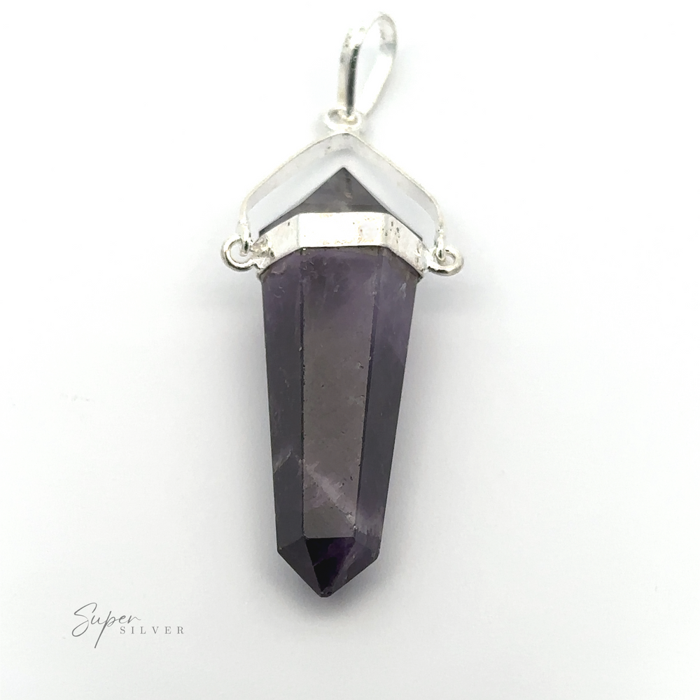 
                  
                    A Raw Stone Swivel Pendant with a pointed amethyst crystal set in a silver-plated setting. The dark purple gemstone's top edge is framed by a silver piece, attached to a bail for a necklace.
                  
                