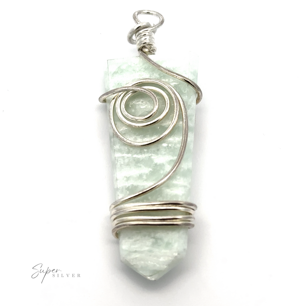 
                  
                    A stunning silver wire-wrapped Stone Slab Pendant with Wire Wrapping featuring a light green crystal.
                  
                