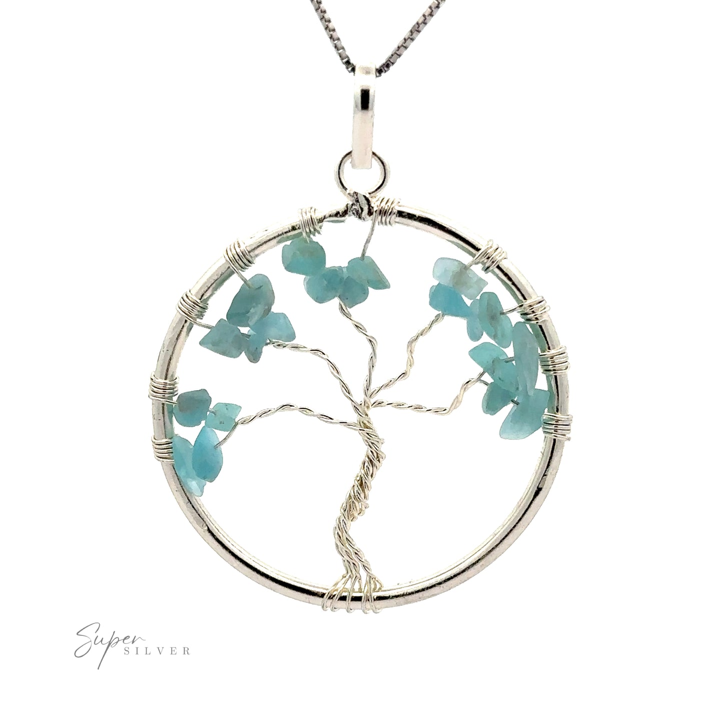 
                  
                    A Wire Wrapped Tree of Life Pendant with Stones in the shape of a tree with blue stone leaves, attached to a chain. The tree is crafted out of wire within a circular frame, showcasing intricate wire wrapped design. The text "Super Silver" appears at the bottom left.
                  
                