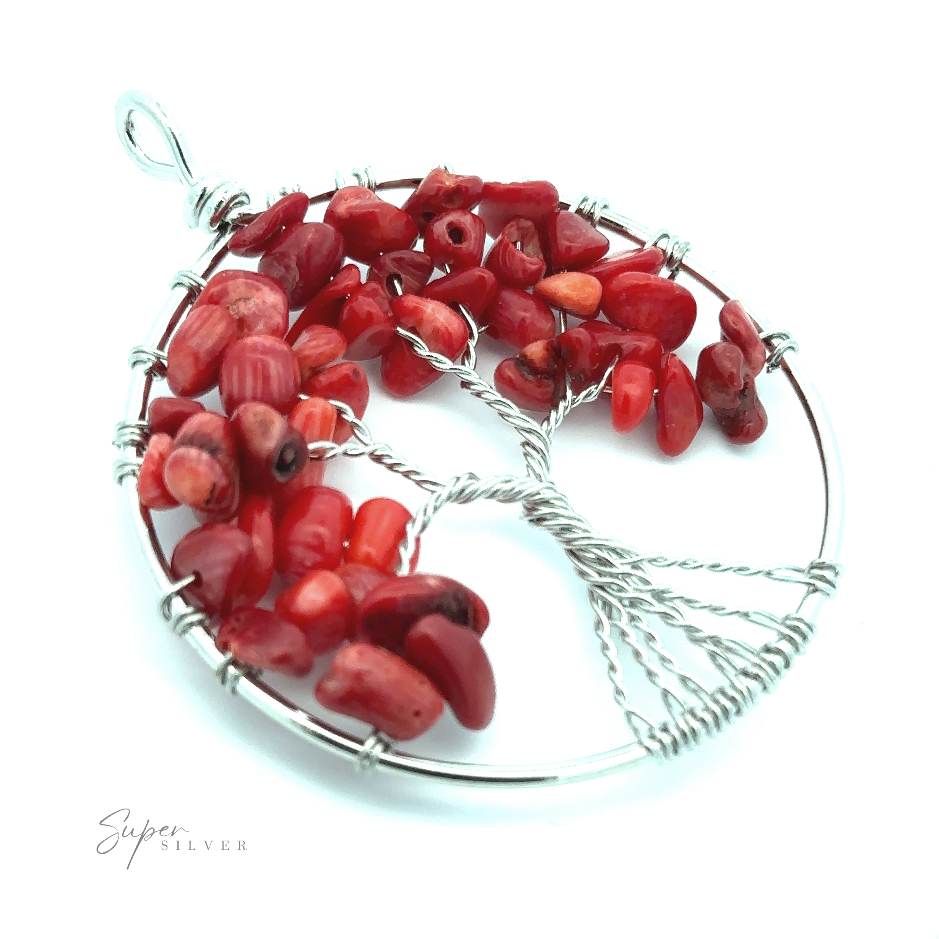 A Wire Wrapped Tree of Life Pendant with a silver wire frame, featuring branches and leaves made from polished red coral gemstones. The mixed metals design gives it a unique touch, set beautifully against a white background.