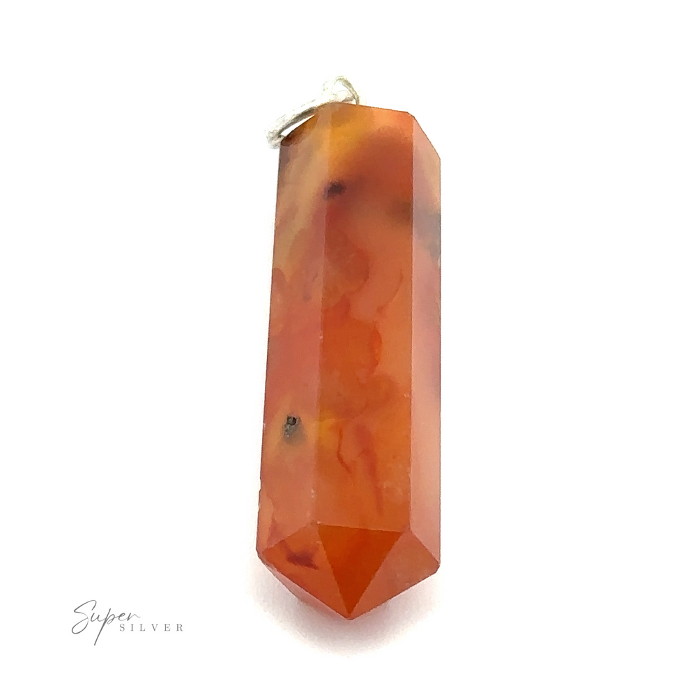 
                  
                    A polished red-orange hexagonal gemstone pendant with a silver loop at the top, set against a white background, exudes an elegant charm. This Raw Stone Obelisk Pendant showcases intricate craftsmanship and timeless appeal.
                  
                