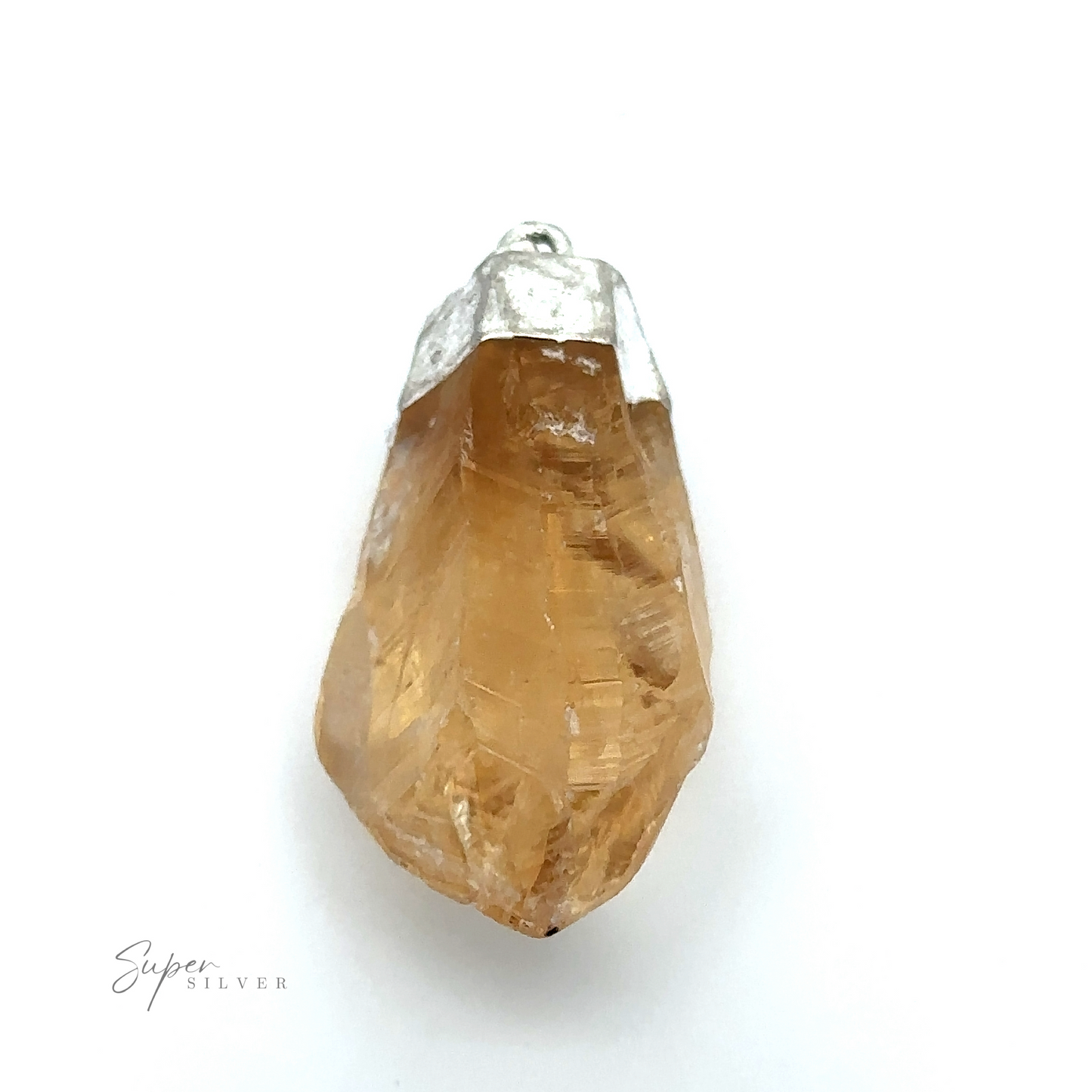 
                  
                    A Raw Crystal Pendant With Silver Cap featuring a raw citrine crystal with a silver cap and loop for attaching to a chain, set against a plain white background. The logo "Super Silver" is visible in the lower-left corner.
                  
                