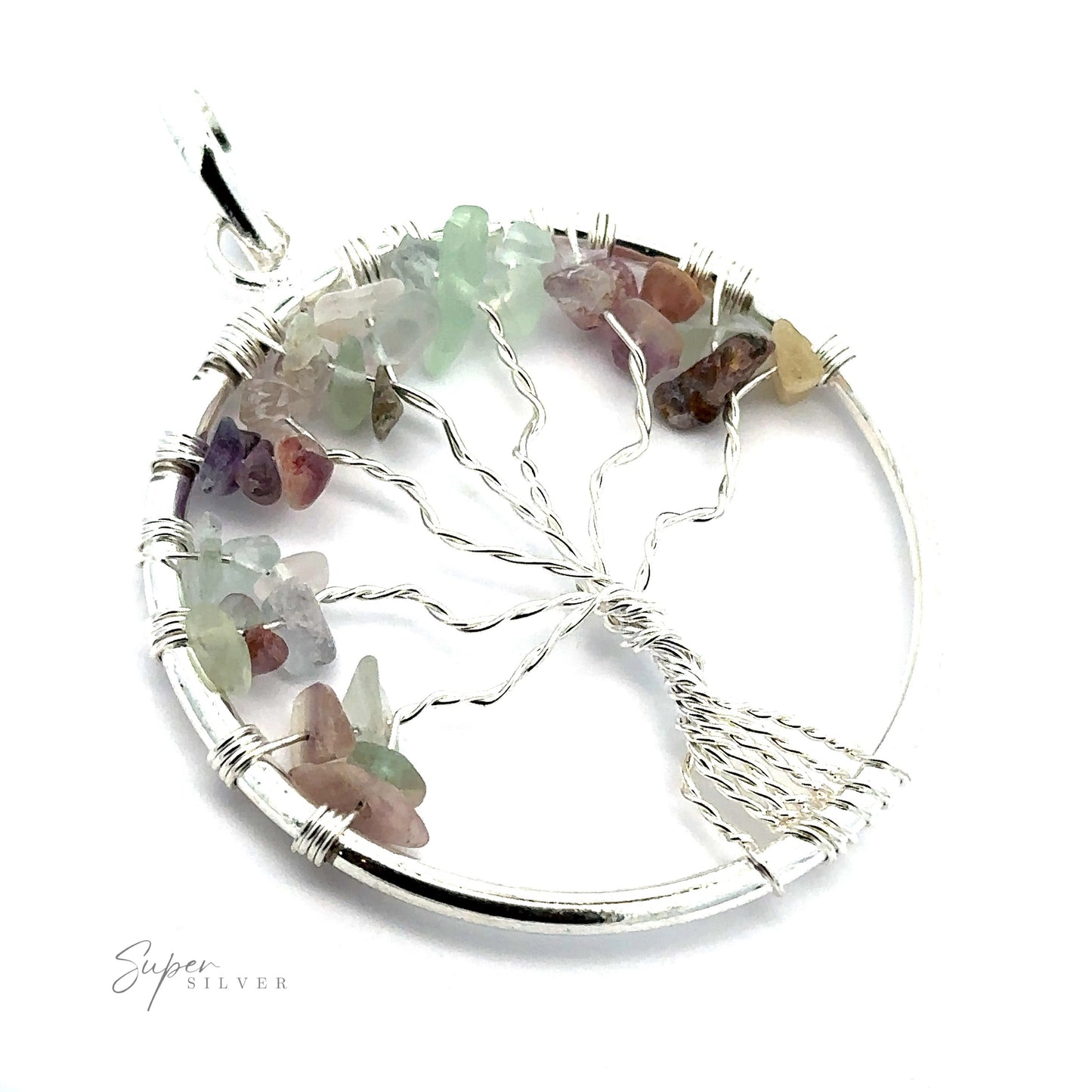 
                  
                    A Wire Wrapped Tree of Life Pendant with Stones, adorned with assorted small gemstones in shades of green, pink, and purple. The tree's branches and roots are intricately wire wrapped in silver.
                  
                