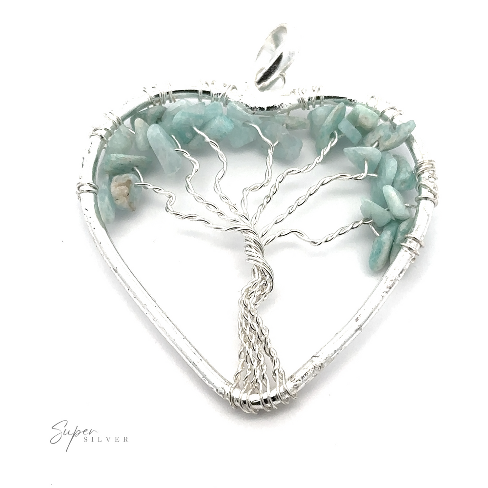 
                  
                    A Heart Shaped Tree of Life Pendant made of wire features a stunning tree design, with branches that hold greenish-blue raw stone beads, creating a beautiful wire-wrapped tree of life pendant.
                  
                
