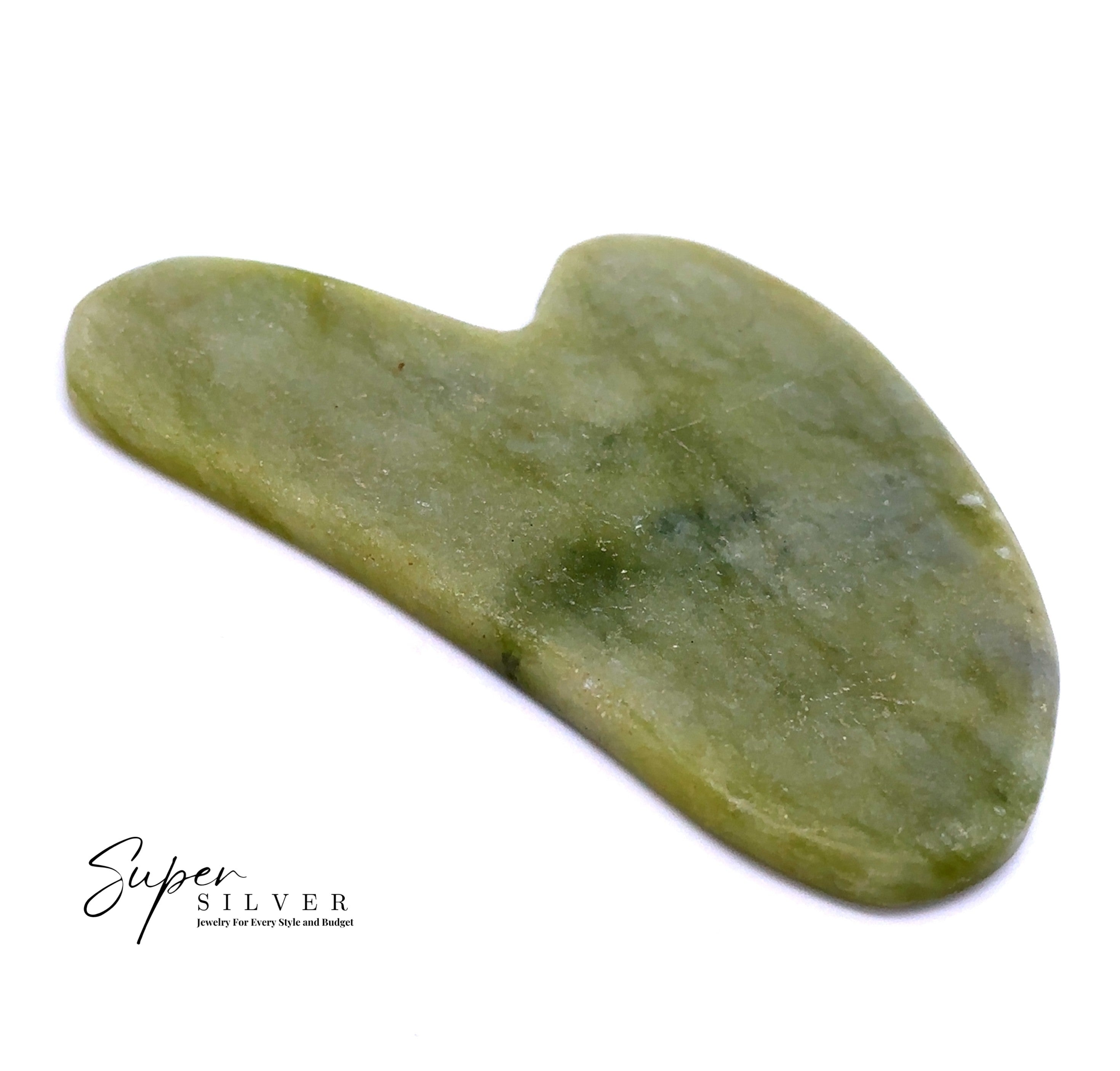 A Stone Gua Sha, crafted from authentic green jade, is displayed on a white background. The text "Super Silver" appears in the corner, highlighting this self-care essential.