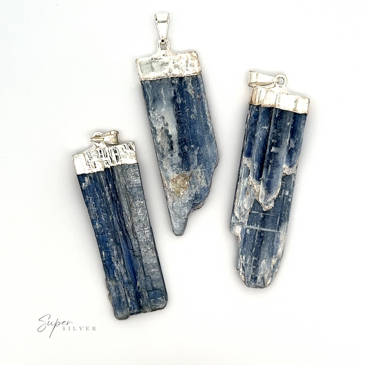 
                  
                    Three blue kyanite Raw Crystal Pendants With Silver Cap arranged on a white background. Text "Super Silver" in the bottom left corner, showcasing these stunning Natural Gemstone pendants.
                  
                