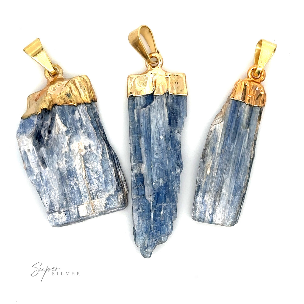 
                  
                    Three Raw Crystal Pendants With Gold Caps are arranged on a white background.
                  
                