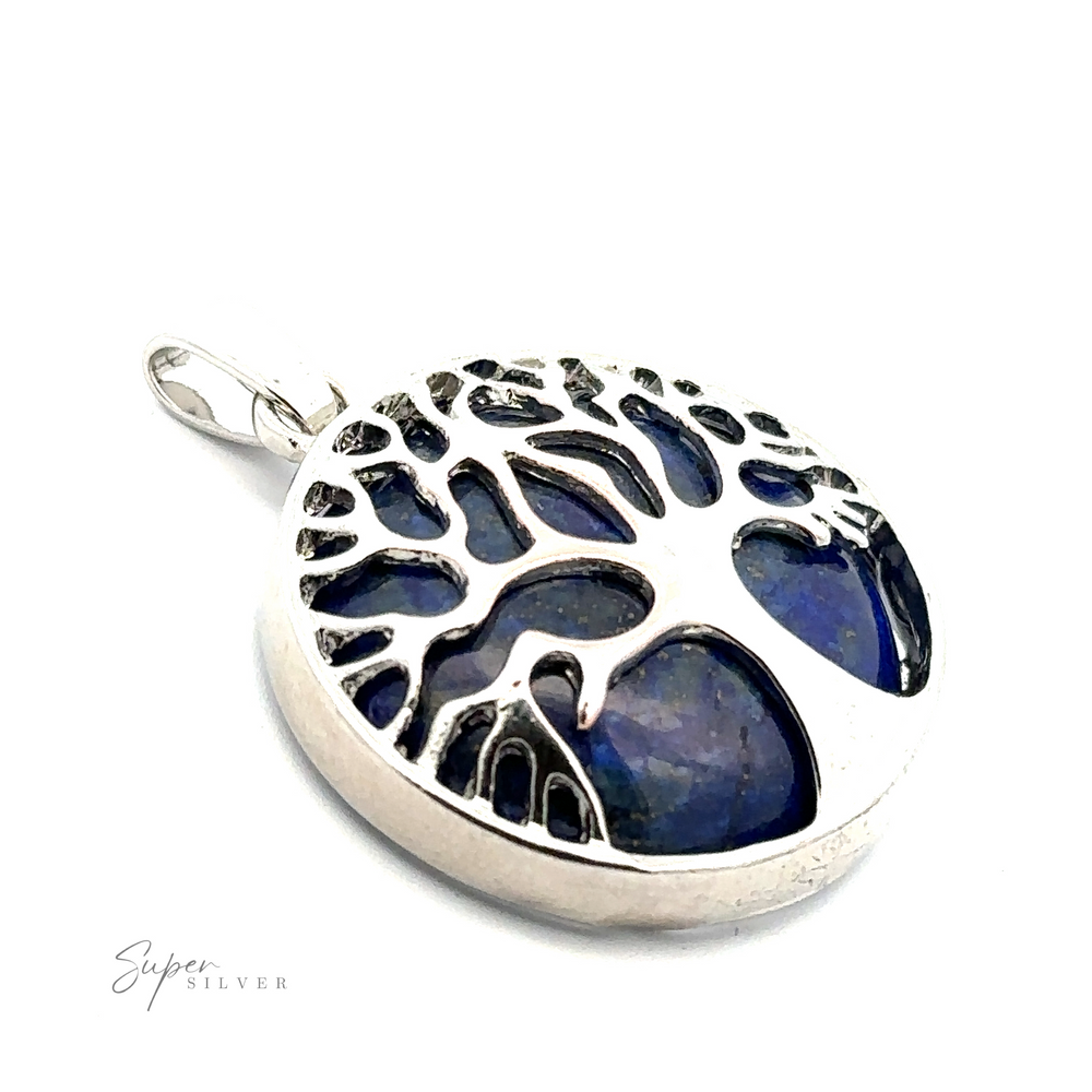 
                  
                    A silver-plated Tree of Life Pendant with a striking blue gemstone background, the brand name "Super Silver" is elegantly visible in the corner.
                  
                