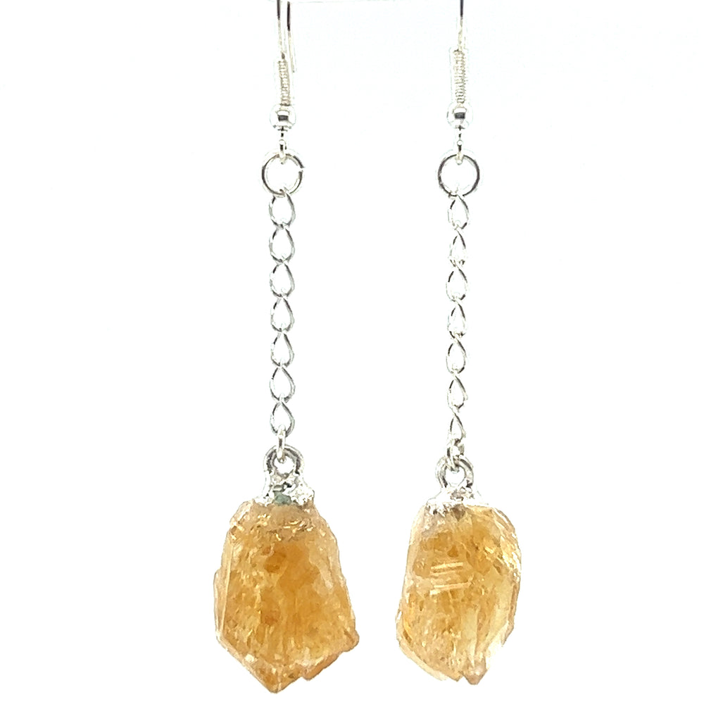 
                  
                    A pair of Super Silver Long Crystal Earrings With Chain with a yellow citrine stone.
                  
                