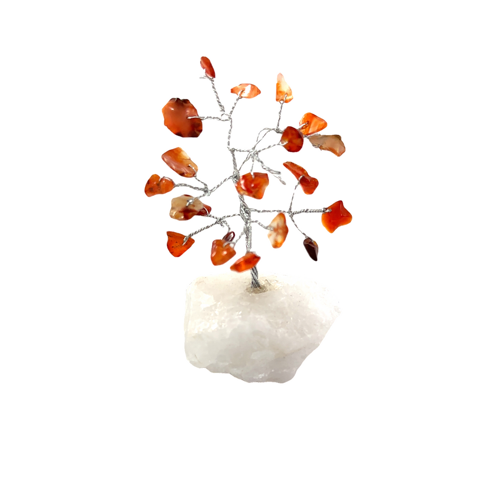 
                  
                    A Delicate Wire Tree with Gemstones adorned with orange gemstones on top of a white rock, perfect for home decor.
                  
                