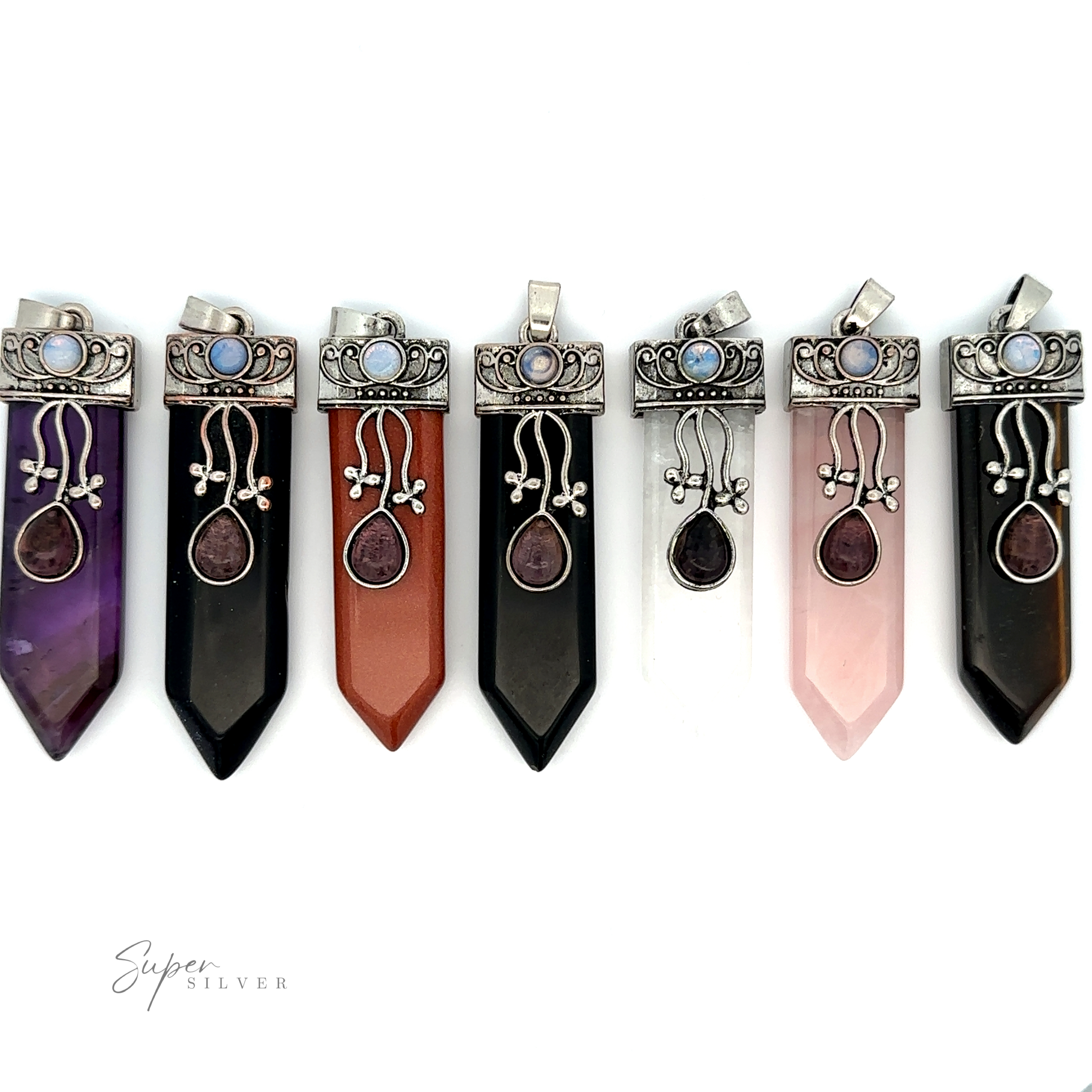 Seven Obelisk Crystal Stone Pendants in various colors, each with ornate silver caps featuring blue stones and dangling decorations. The collection includes mesmerizing amethyst and glowing opalite.