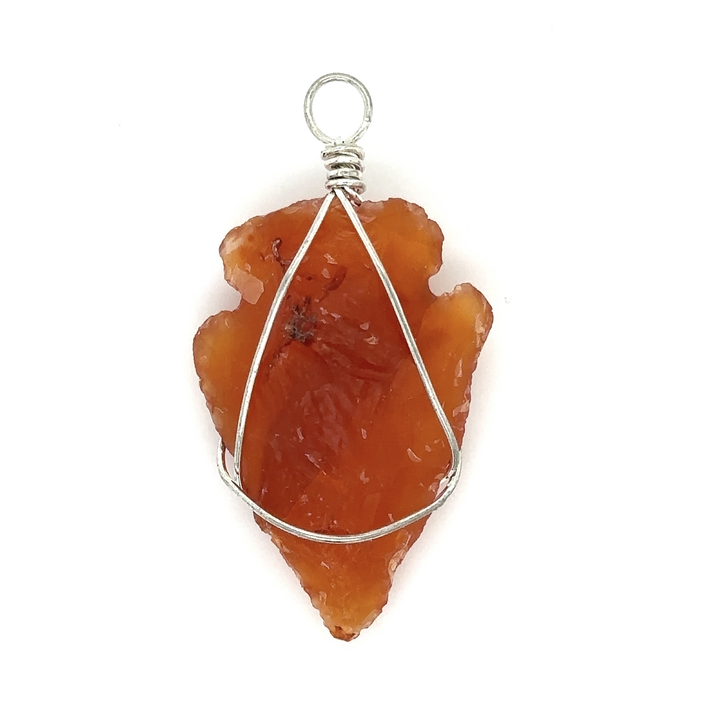 
                  
                    A stylish Wire Wrapped Stone Arrowhead Pendant featuring an orange arrowhead with a silver wire wrapped around it, by Super Silver.
                  
                