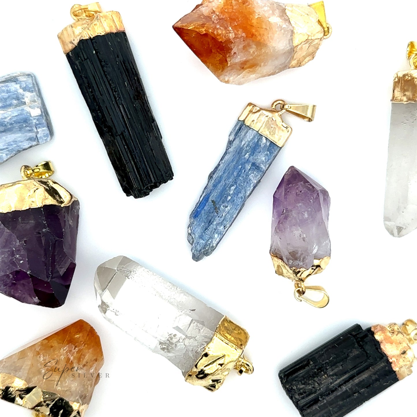 A collection of Raw Crystal Pendant With Gold Cap featuring raw crystals, including amethyst, citrine, black tourmaline, and quartz, all adorned with gold-plated caps and attachment loops.