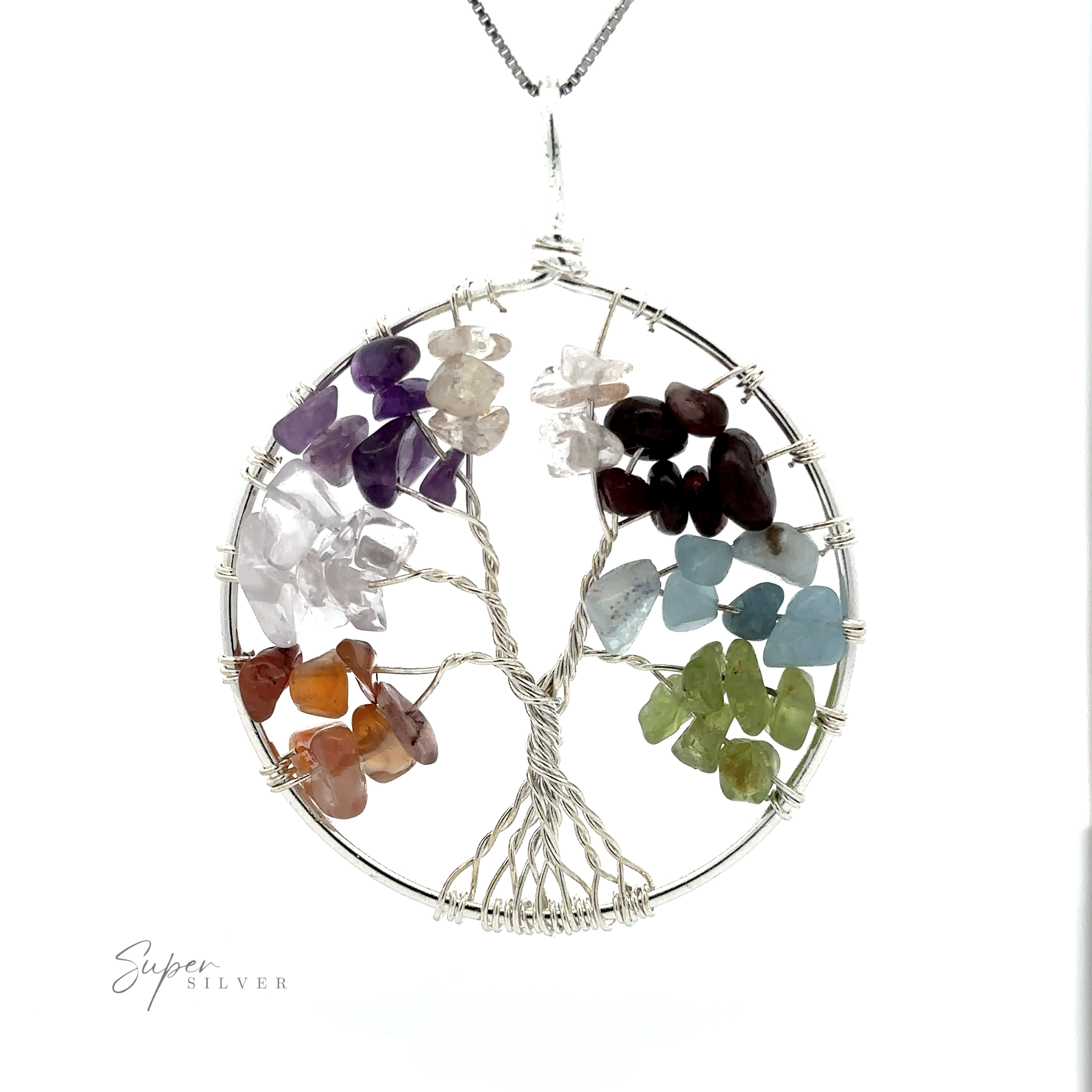 A Wire Wrapped Tree of Life Pendant featuring branches adorned with multicolored gemstone chips, attached to a silver chain. This exquisite Wire Wrapped Tree of Life Pendant artfully blends mixed metals for a unique touch.